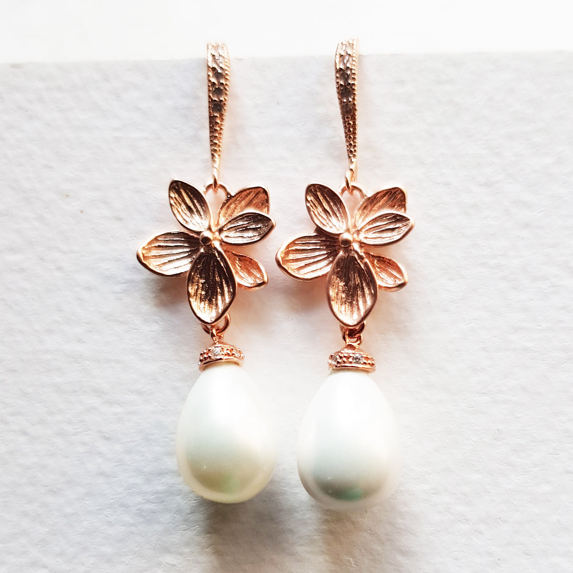 Flower pearl earrings rose gold