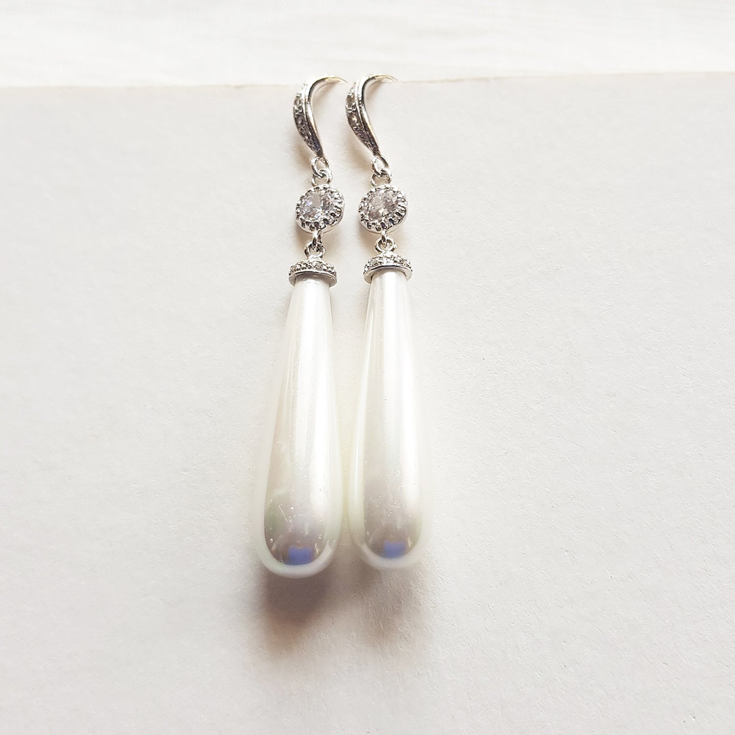 Long dangle pearl earrings in gold, silver and rose gold