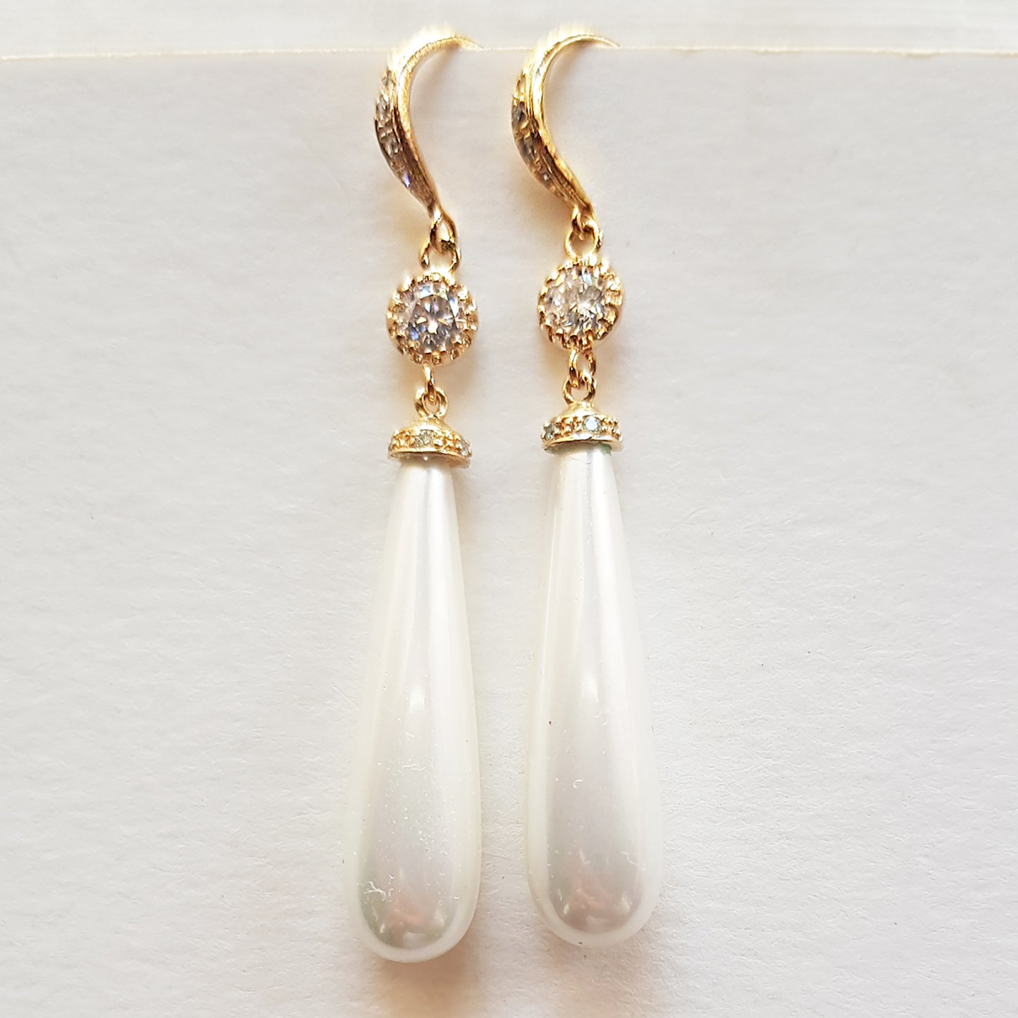 Long dangle pearl earrings in gold, silver and rose gold