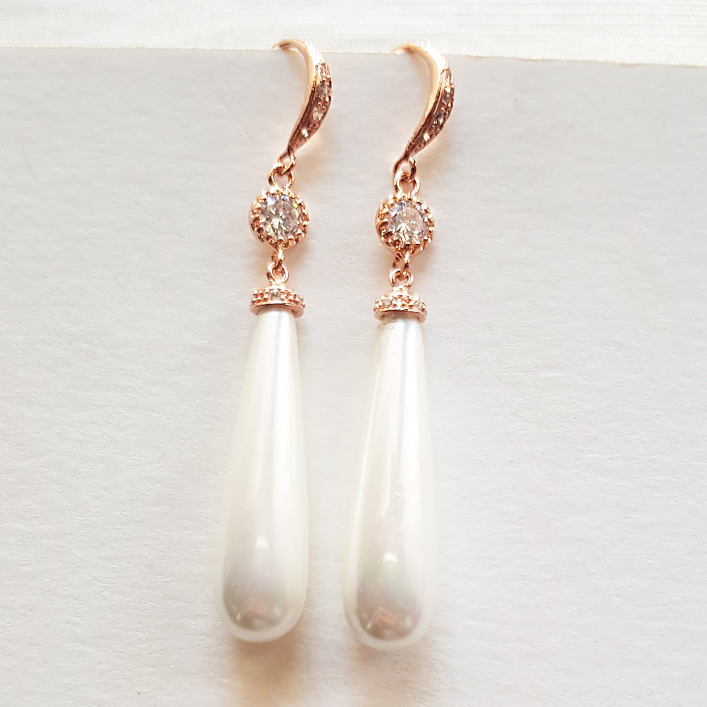 Long dangle pearl earrings in gold, silver and rose gold