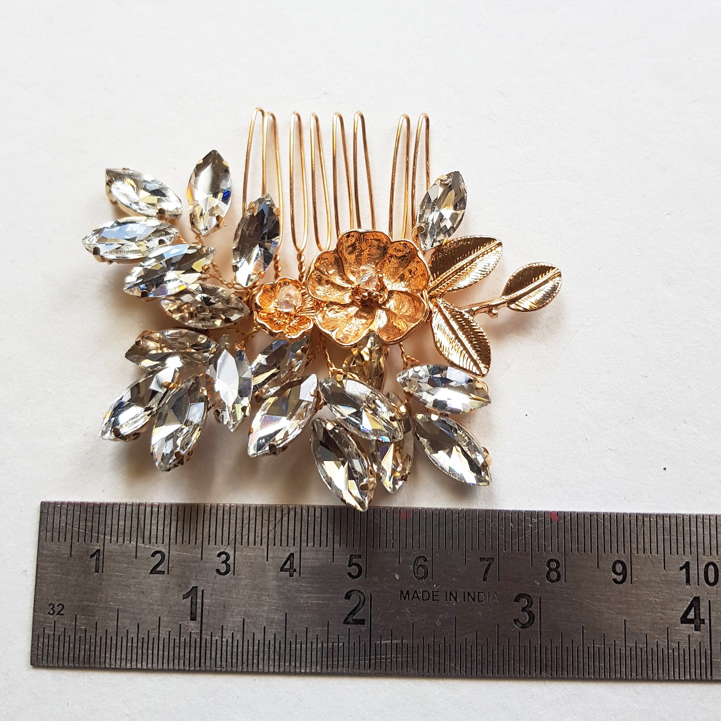 Small crystal bridal comb in gold