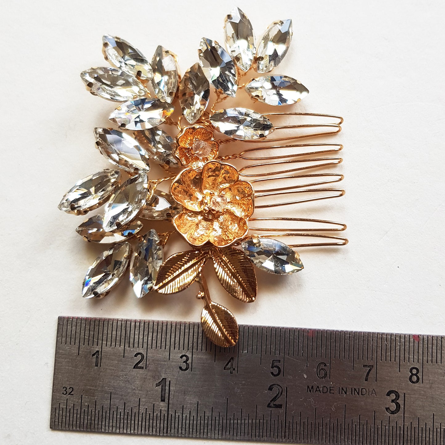 Small crystal bridal comb in gold