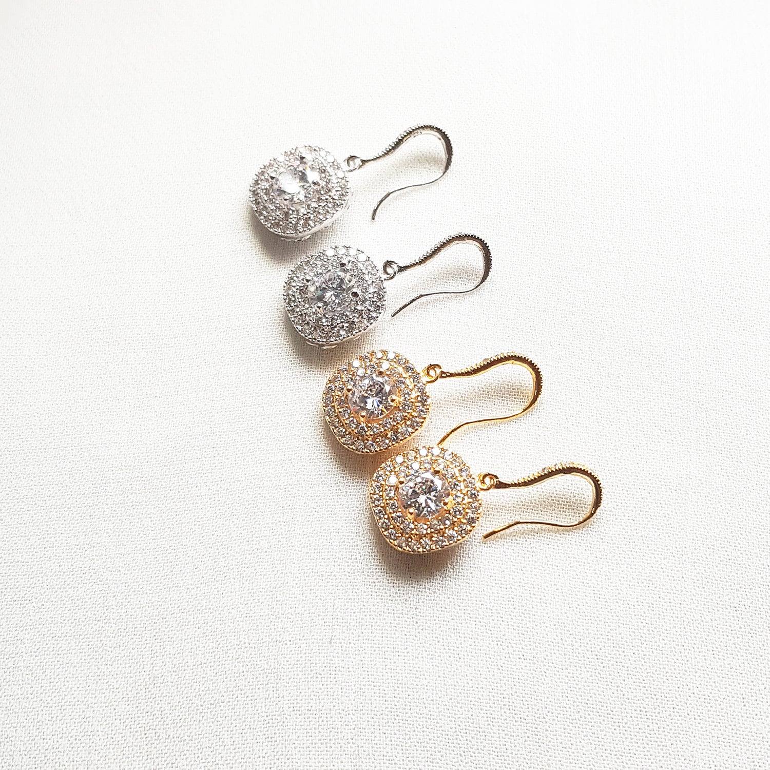 Square cubic zirconia earrings in silver and gold