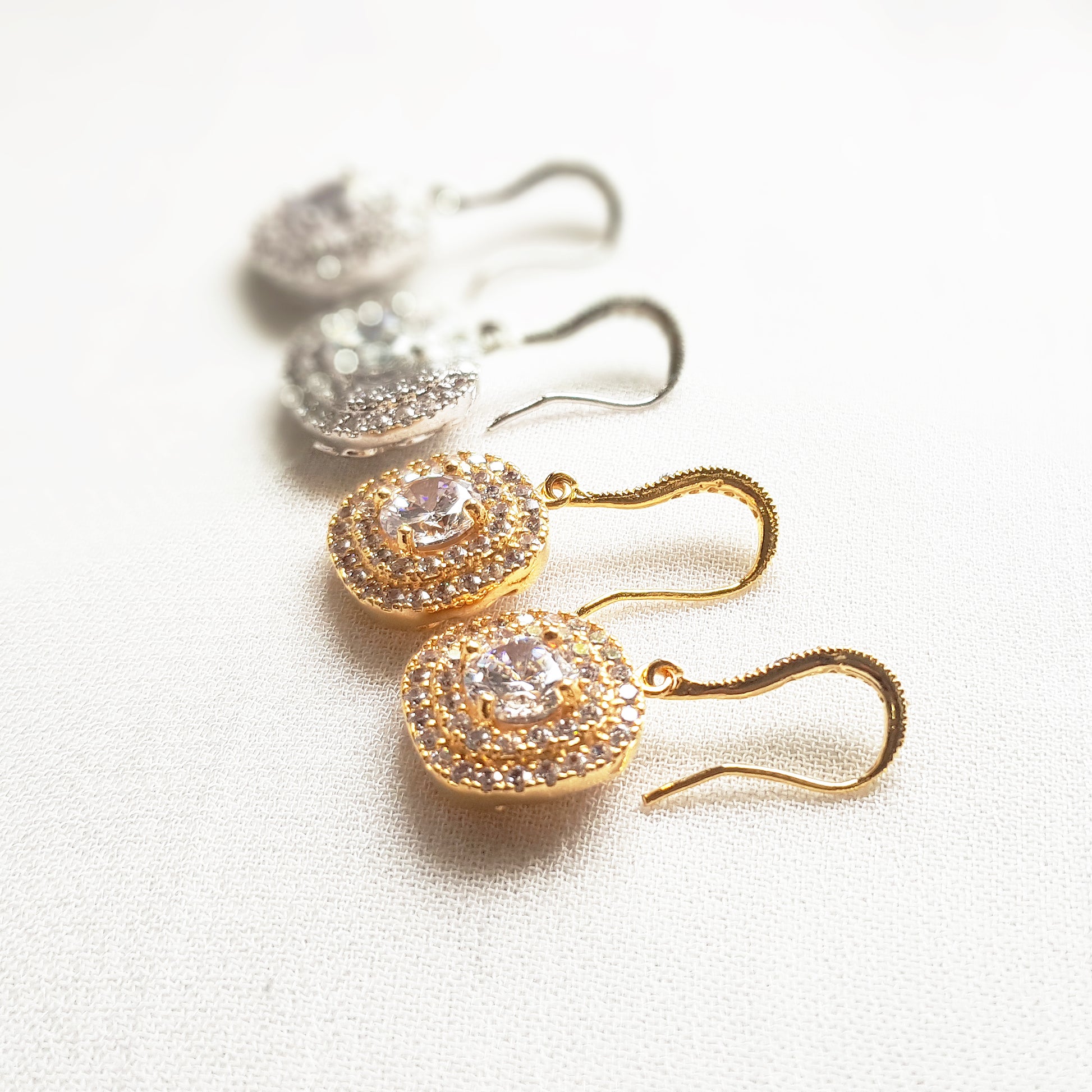 Square cubic zirconia earrings in silver and gold