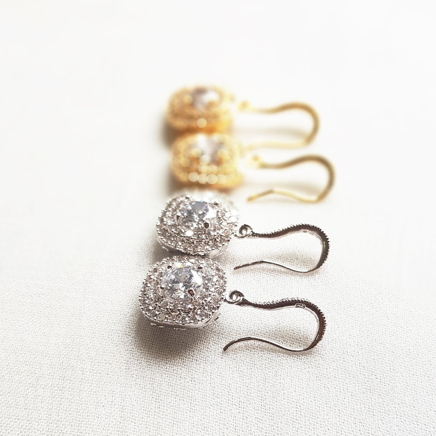 Square cubic zirconia earrings in silver and gold