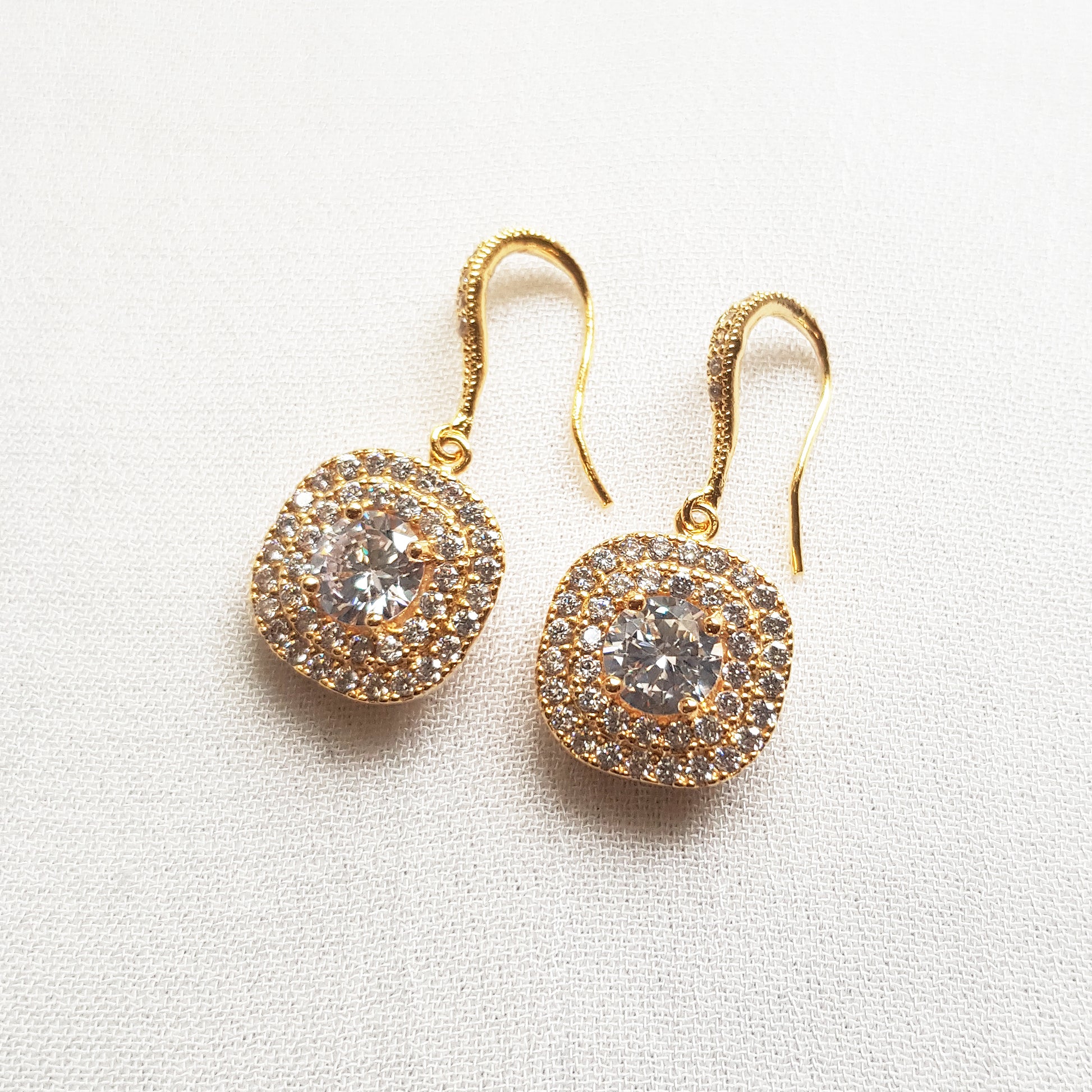 Square cubic zirconia earrings in silver and gold