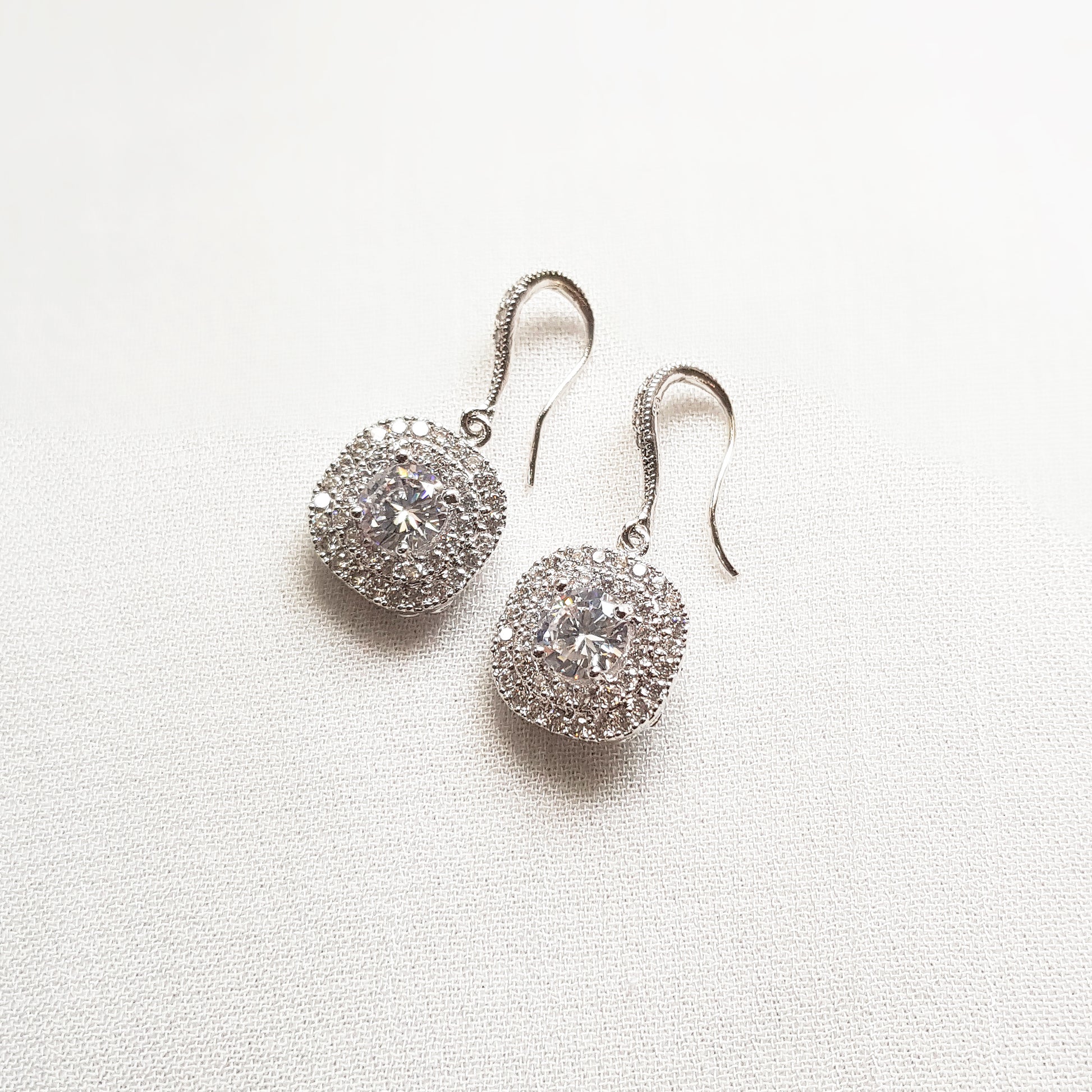 Square cubic zirconia earrings in silver and gold