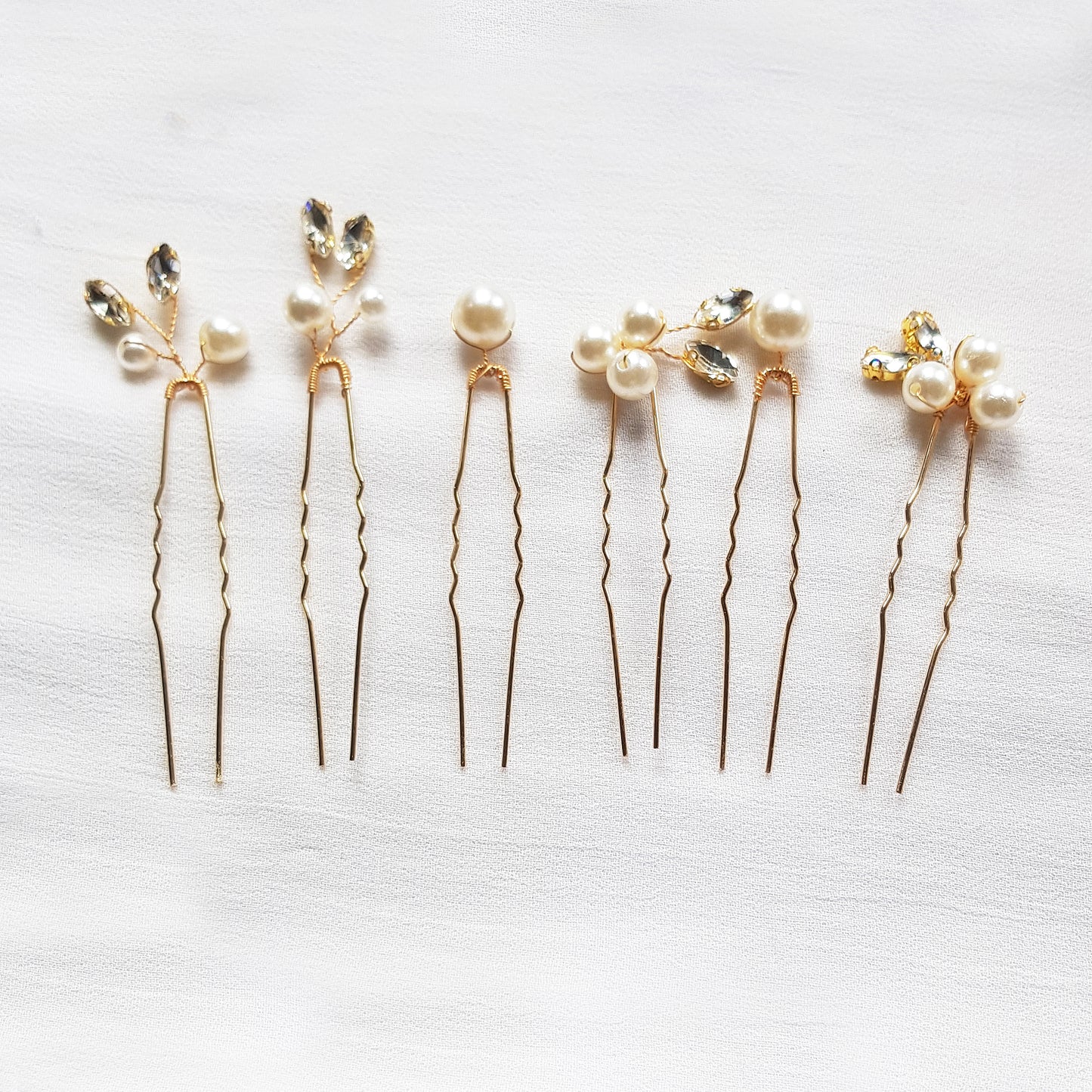 Dainty rhinestone and pearl bridal hairpins