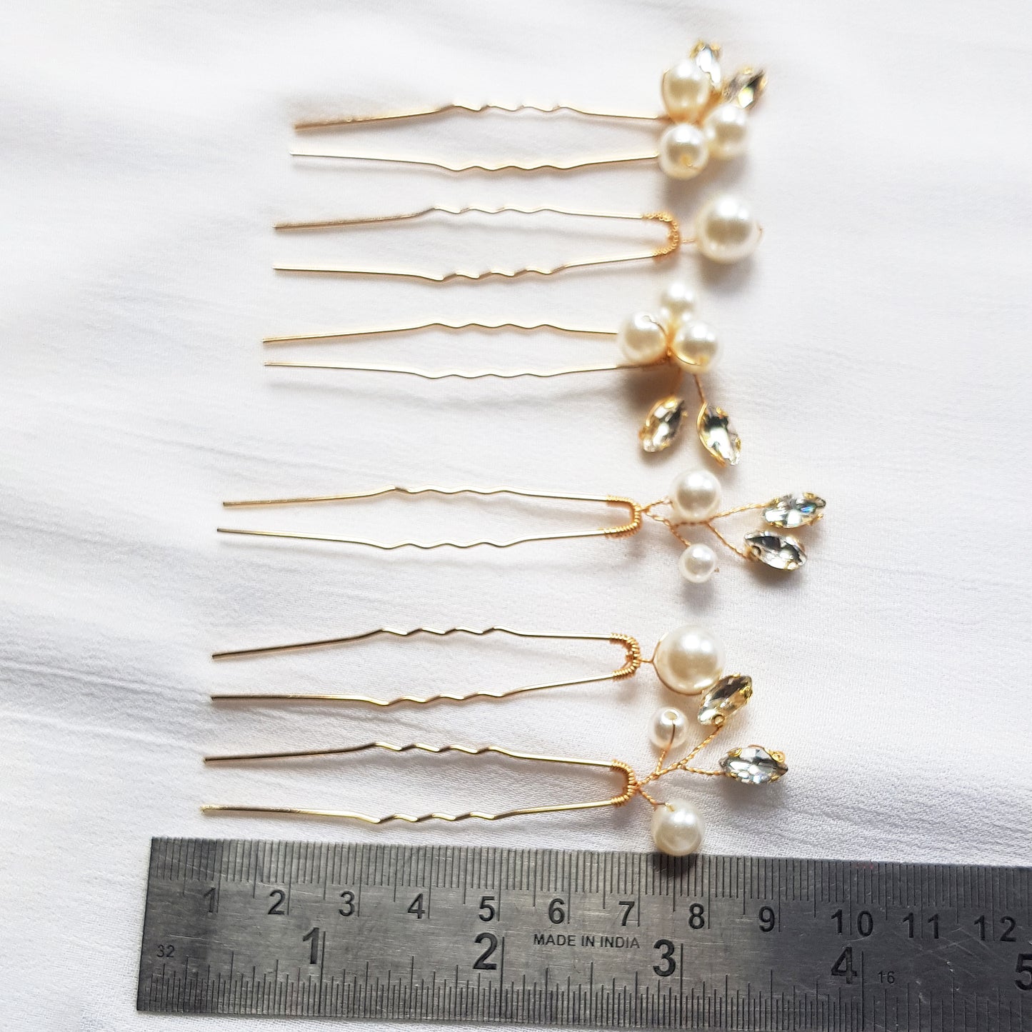 Dainty rhinestone and pearl bridal hairpins