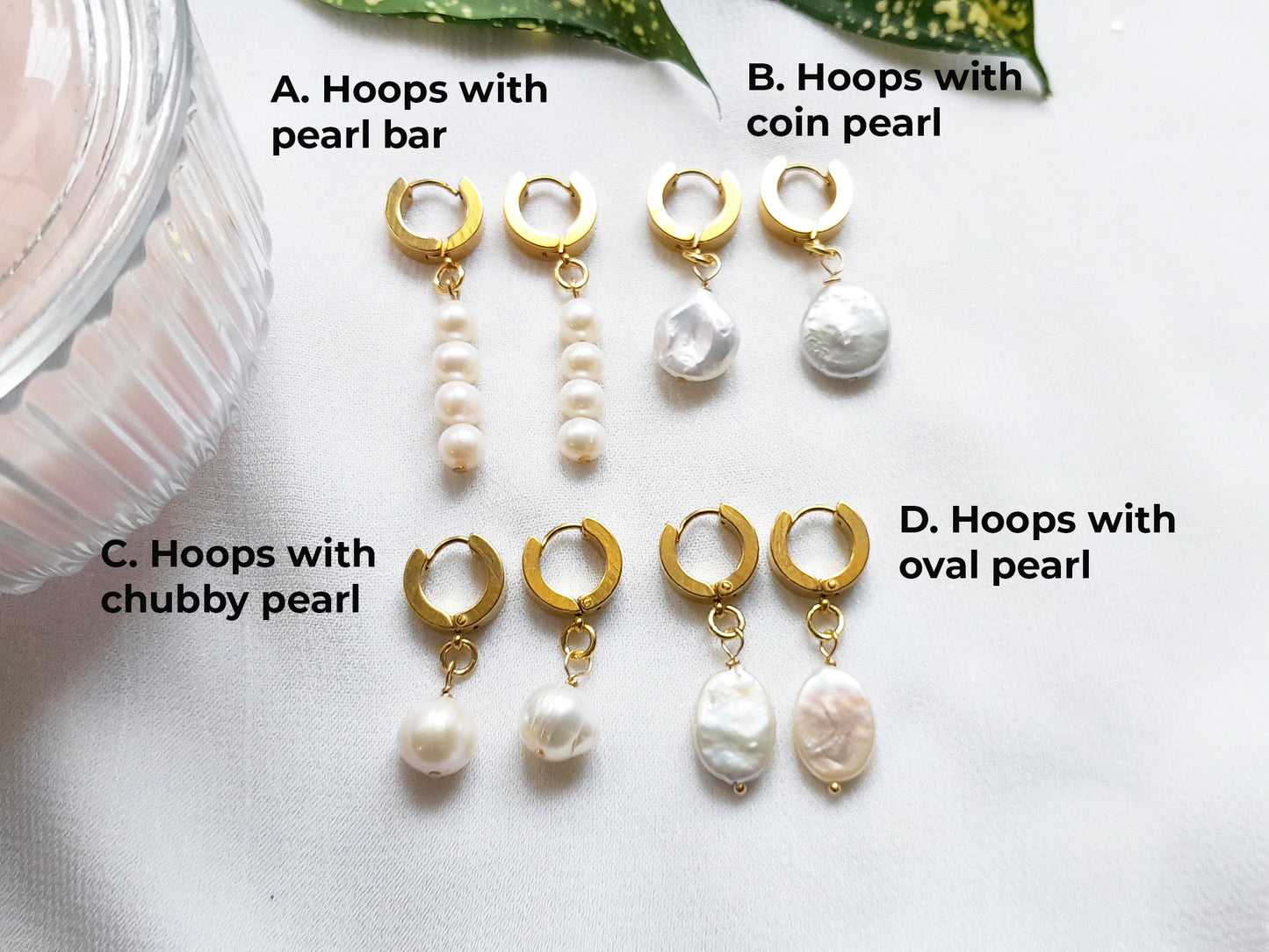 Thick gold hoop earrings with pearl charm