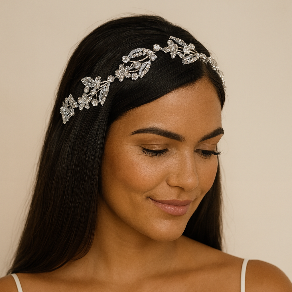 Woman wearing a decorative headband with a plain background